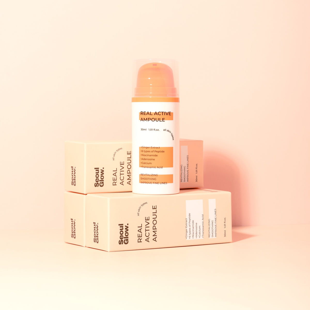 SEOULGLOW Real Active Ampoule bottle on stacked packaging boxes